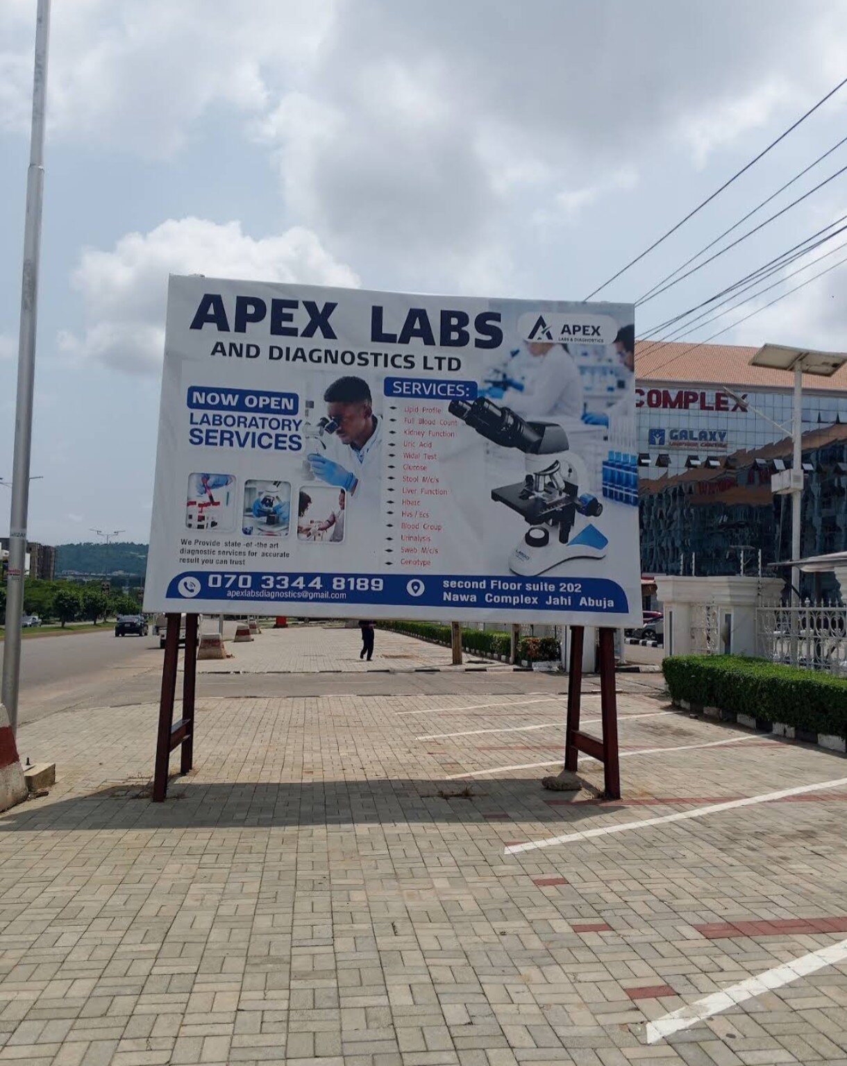 Apex Labs roadside billboard in Jahi, Abuja